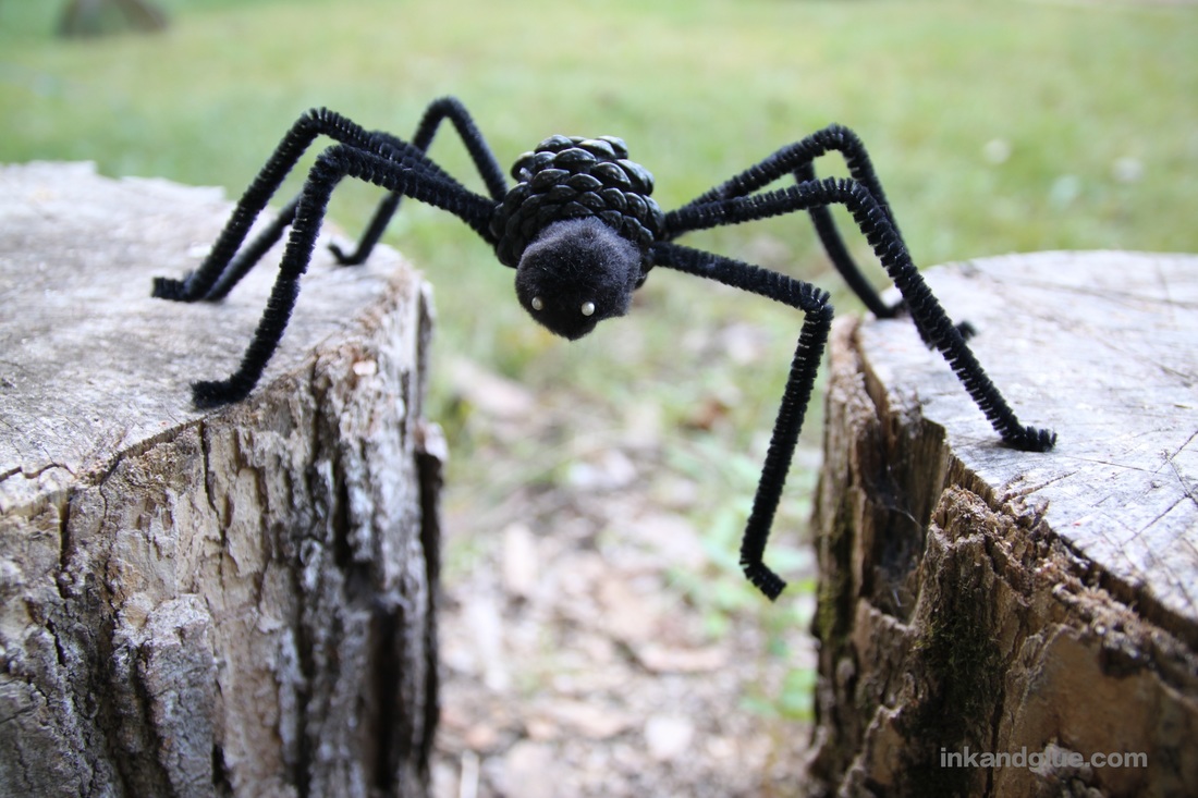 Halloween pinecone spider craft for kids